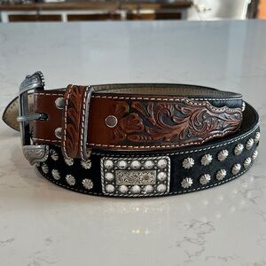 Nocona western belt. Leather tooled hair-on size 34